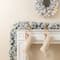 Glitzhome® 6ft Pre-Lit Snow Flocked Greenery Pine Christmas Garland with Timer, 2ct.